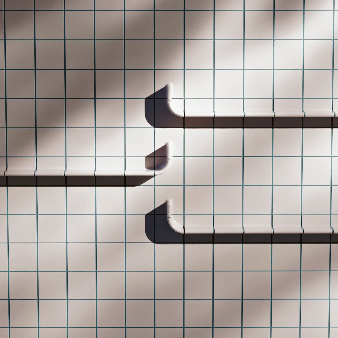 Cinematic top-down CGI of continuous modular shelf elements integrated into a tiled grid, illustrating linear composition, manufacturable seams, and flexible layout possibilities.